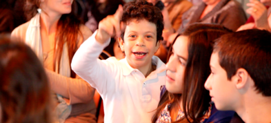Niño con Síndrome de Williams de la Escuela